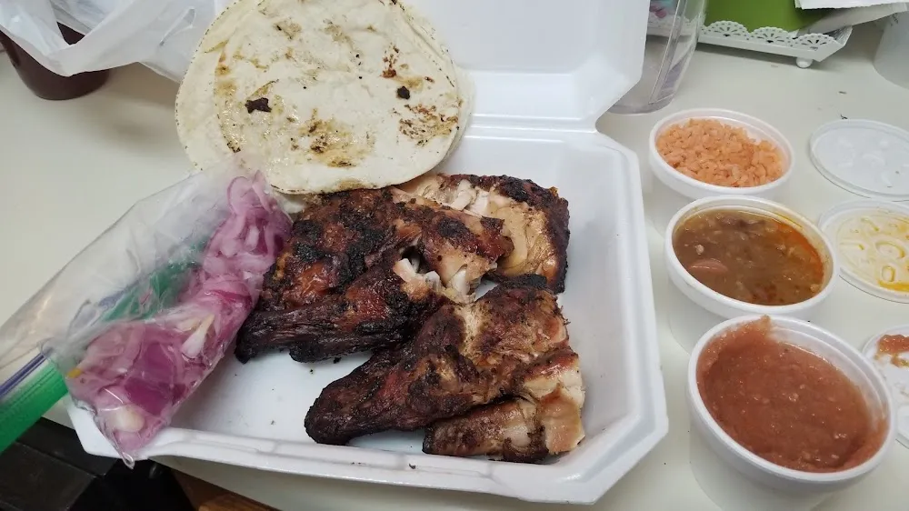 Grilled Chicken Rice Pickled Onions Beans & a Tortilla